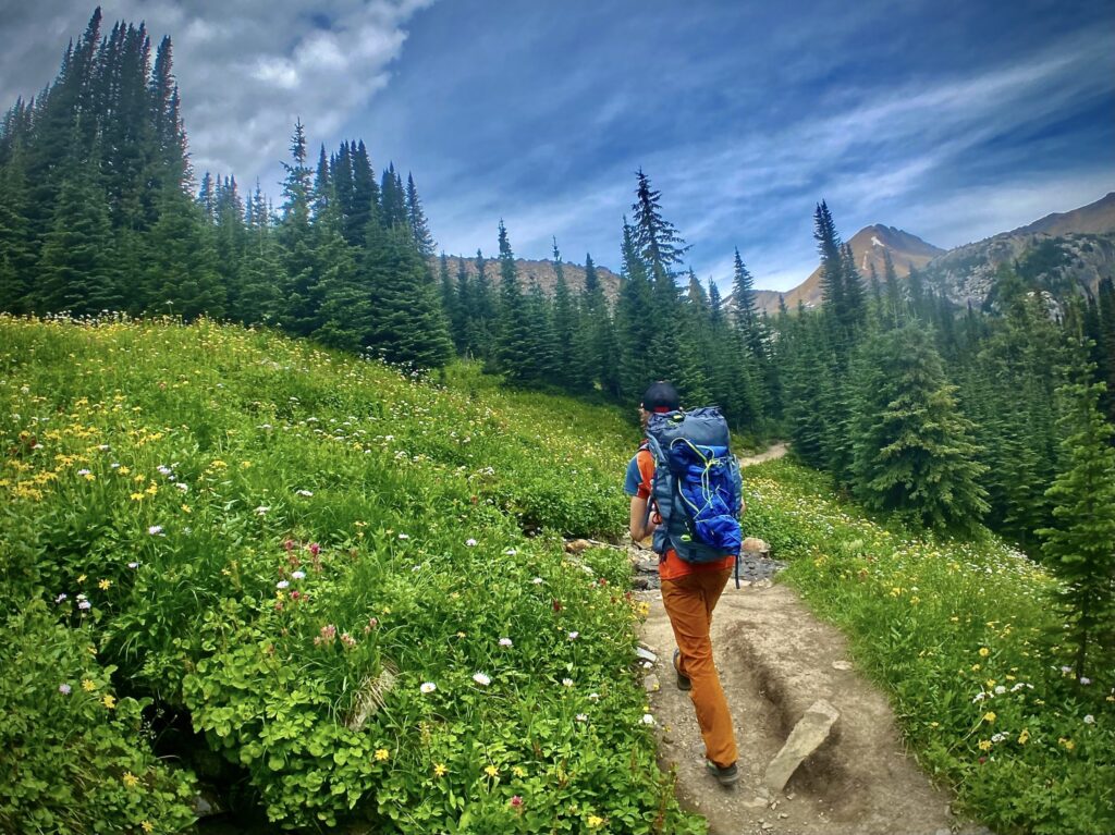 This image shows a hiker/backpacker enjoying the Helen/Bow Lake areas.