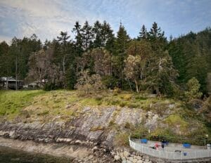 This image depicts North Pender Island, located in the Salish Sea, a region known for its ecological diversity in the Pacific Northwest. The Salish Sea extends along the southern coast of British Columbia and parts of Washington State, serving as a substantive body of water for both peoples’ activities and marine ecosystems.